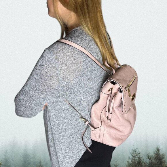 Michael Kors Riley small pebbled leather flap backpack in a light pink color main image 5